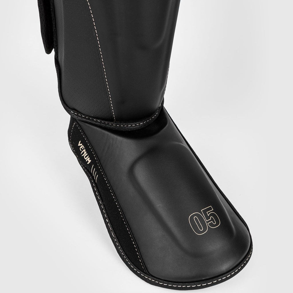 VENUM IMPACT EVO Canilleras para Muay Thai, Kickboxing y MMA